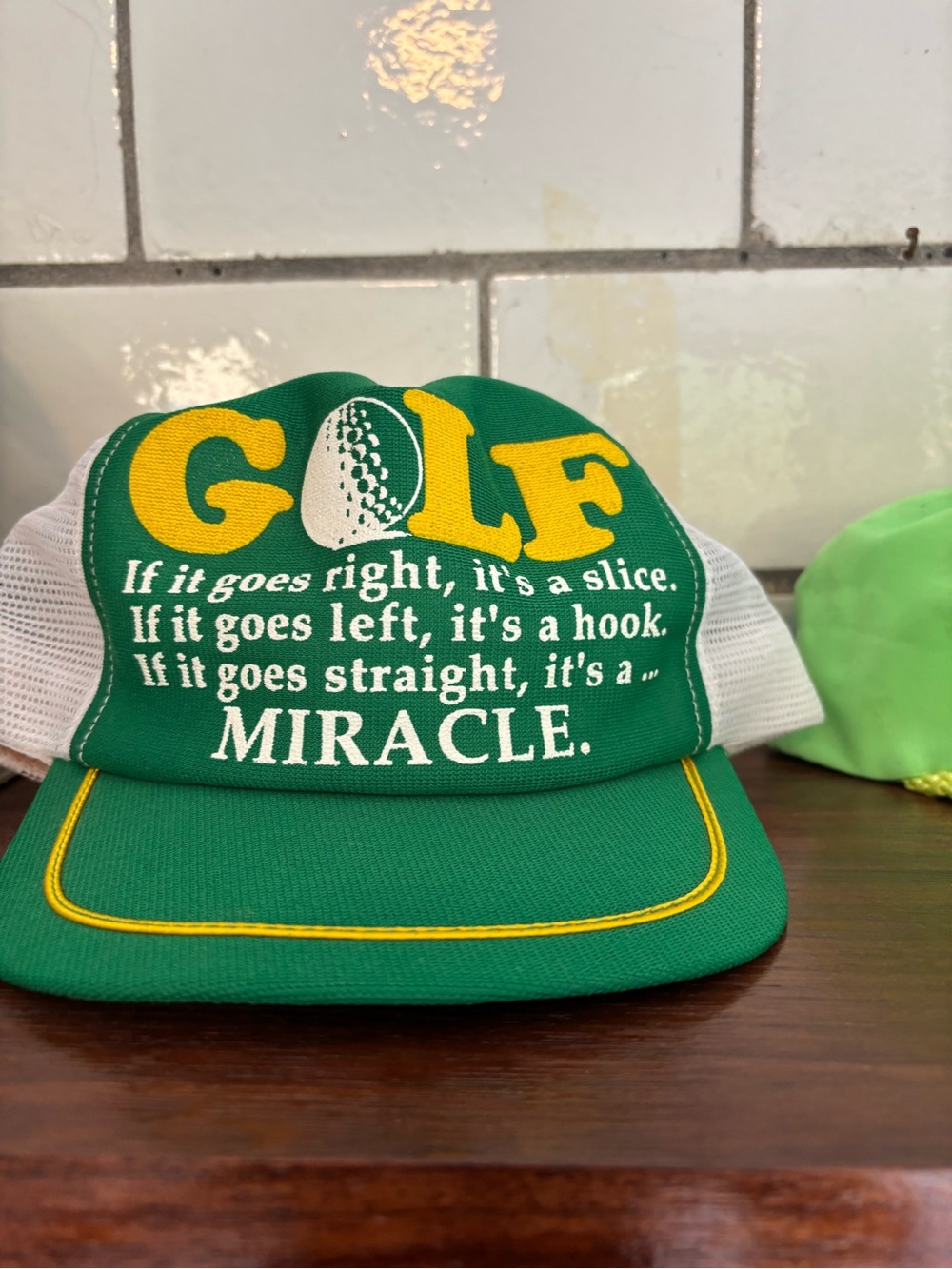 Green Golf Trucker Hat with Yellow Lettering